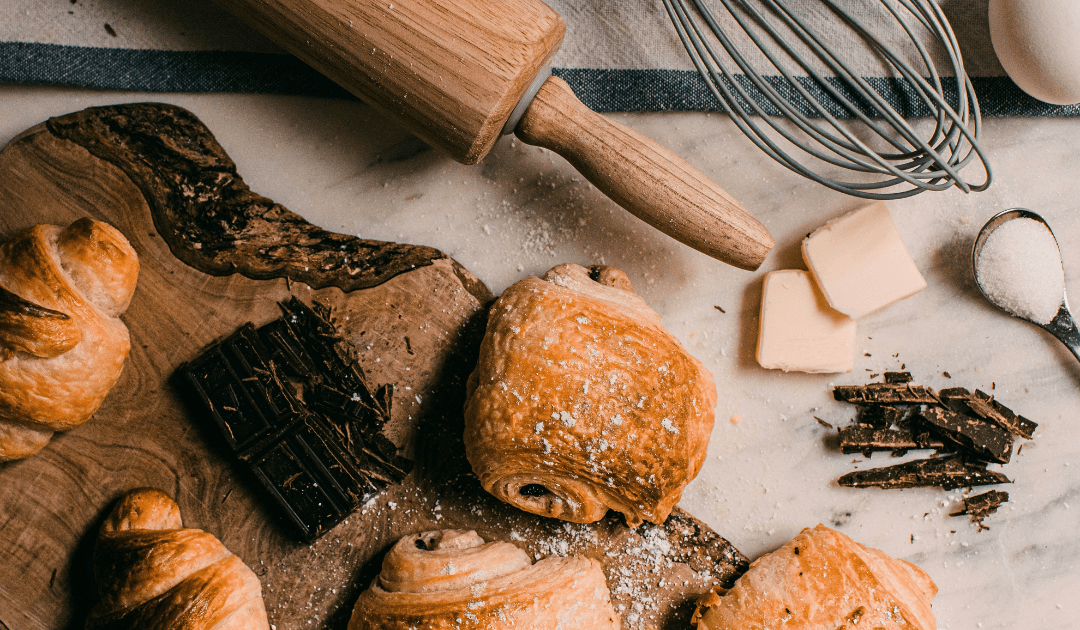 Pastries on a table with a rolling pin and whisk | The Italian On Tour