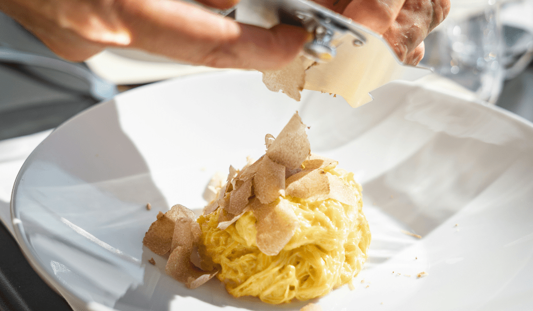 Truffles being shaved over pasta | The Italian On Tour