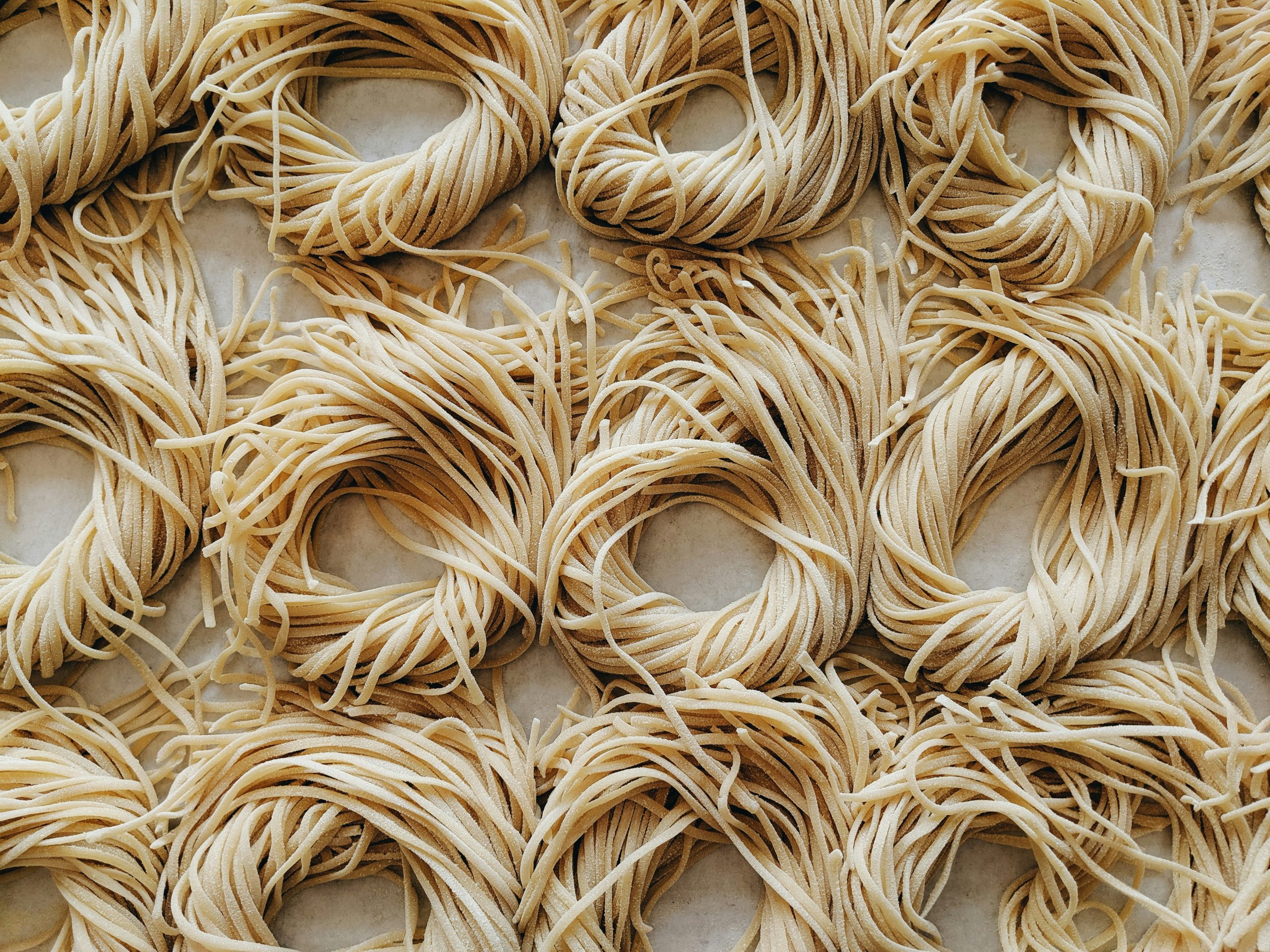 Fresh pasta on a surface | The Italian On Tour